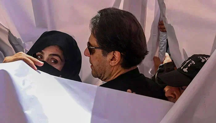 ISLAMABAD: In a significant development, PTI founder Imran Khan and his wife Bushra Bibi have been acquitted in the iddat case, also known as the un-Islamic nikah case. The district and sessions court on Saturday accepted their pleas seeking annulment of their conviction, providing much-needed relief for the couple. Additional Sessions Judge Muhammad Afzal Majoka announced the short order, stating that Khan and Bushra should be released immediately if they are not wanted in any other cases. The couple was previously sentenced to seven years in prison and fined Rs500,000 each in February, after a trial court deemed their nikah fraudulent based on a complaint by Bushra's ex-husband, Khawar Maneka. They subsequently challenged their conviction and sought various forms of relief from the Islamabad High Court (IHC). In the 28-page verdict, the court highlighted that Maneka had remained passive for about six years, causing his right of Ruju (the reconciliation period after divorce) to expire. The court concluded that Maneka failed to prove his case against Khan and Bushra, and therefore ordered their immediate release. Additionally, the court rejected petitions for the formation of a medical board and consultations with religious scholars. This acquittal is particularly significant for Khan, who has been behind bars since August last year due to convictions in multiple cases, including the Toshakhana criminal case. Despite securing relief in several other cases, Khan remained imprisoned due to the iddat case. He has also been granted bail in several cases registered on May 9 in Lahore, Rawalpindi, and Faisalabad. Last month, the IHC instructed the district court to decide on the pleas seeking suspension of the sentence within 10 days and on the pleas challenging the conviction within a month. However, on June 27, Judge Majoka rejected the couple’s pleas for suspension of their sentence. Background of the Iddat Case The iddat case began when a petitioner claimed that Bushra married Khan on January 1, 2018, before her iddat period had ended following her November 2017 divorce. Although a district court initially rejected this plea, Bushra’s ex-husband Maneka later filed a complaint on November 25, 2023. The couple was indicted on January 16, 2024, and sentenced to seven years each on February 3. Following multiple appeals, today's verdict annulled their conviction, bringing a significant relief to both Khan and Bushra.