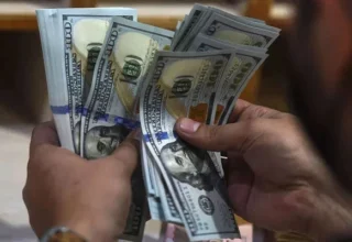 Dollar Falls to Yearly Low Against Euro: Impact and Implications